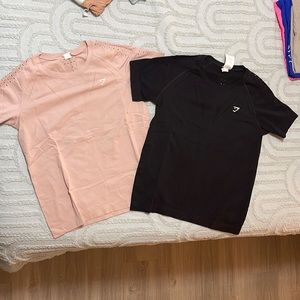 2 gymshark tees. Barely worn. Bought each for $42 and selling both for $20